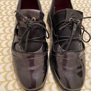 Agilis comfort walk black patent leather flats with tie detail. New never worn